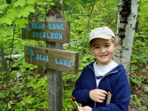 Directions: Turn off Highway 61 into Silver Bay. Follow this road (County Route 5; also called Forest Road 11) through town to the west for about 2.5 miles. Park in the large paved parking lot on the right with the Superior Hiking Trail sign.