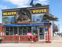 The Beaver House in Grand Marais, famed for its wonderful walleye sculpture, is closing its doors. The walleye is being sold with the building. Photo by Joan Farnam