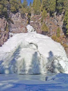 Caribou Falls is easily accessible with a half-mile walk upstream from a wayside parking lot on Highway 61. In winter, the falls is sheathed with an impressive mantle of ice. —Photo by Gary Wallinga 