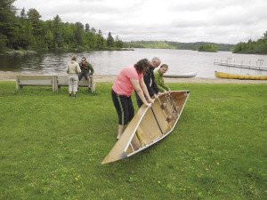 Students learn to portage in the Basic Canoeing class at Ely Folk School. | ELY FOLK SCHOOL