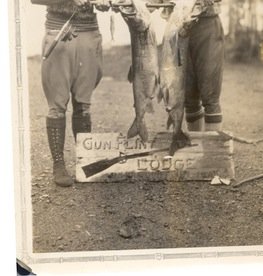 In this photo from the 1920s or ’30s, Justine Kerfoot and a friend held a catch of huge lake trout.