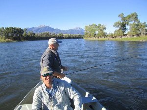 With guide Matt Arnesen on the oars, Ed Arnett tries for trout on Montana's Yellowstone River.