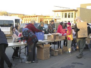 An assembly line is formed to help the distribution process move along. | Breana Roy