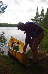 Shawn Perich of Hovland, Minn., north of Grand Marais, prepared a canoe for an evening’s fishing last week in the boundary waters.| Dennis Anderson