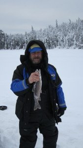 Roger Haertel of Hovland with a splake he caught from a North Shore lake. | Shawn Perich