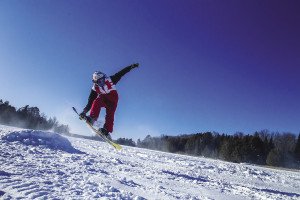 Stunt-style snowboarding and trick riding became popular after events such as the ESPN’s Winter X Games. | JIM STONER