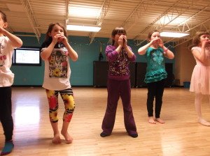 The 1st-3rd graders rehearse their dance in the YMCA studio. | Breana Roy