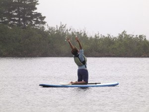 The benefits of yoga multiply when performed on a paddleboard. | STONE HARBOR WILDERNESS SUPPLY