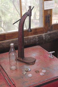 Dorothy capped thousands of bottles of root beer on this equipment, one at a time. | Scott Stowell