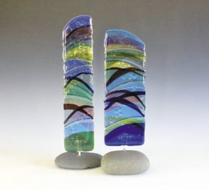 Nancy Seaton works with blown glass to create Superior inspired totems. Her work can be found at Sivertson Gallery in Grand Marais. | NANCY SEATON