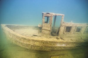 A fish tug boat in Five Finger Bay at Isle Royale. | BRETT SEYMOUR