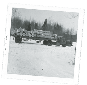 A load of massive logs heading out of Hovland in 1957. | COURTESY OF DUANE JOHNSON
