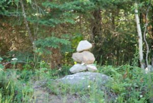One of the hundreds of roadside Inuksuit found in our northern wilds. This inukshuk is at forest edge along a backroad in village of Nakina, northeast of Thunder Bay. ELLE ANDRA-WARNER