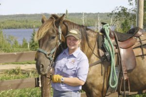 Mandy Huskey, head wrangler and manager of the stables at Gunflint Lodge, has been involved with horses since age eigth. | GUNFLINT LODGE