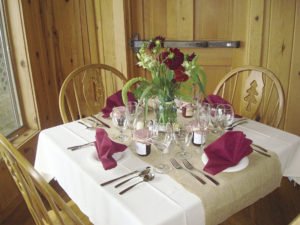 New romantic tables in dining room at Gunflint Lodge. | SUBMITTED 