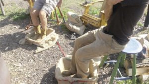 Treading or jigging by foot helps remove the hull from the rice kernels. | JULIA PRINSELAAR