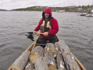 When living in the Boundary Waters, everyday chores included chopping and hauling wood.