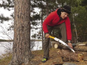 When living in the Boundary Waters, everyday chores included chopping and hauling wood.