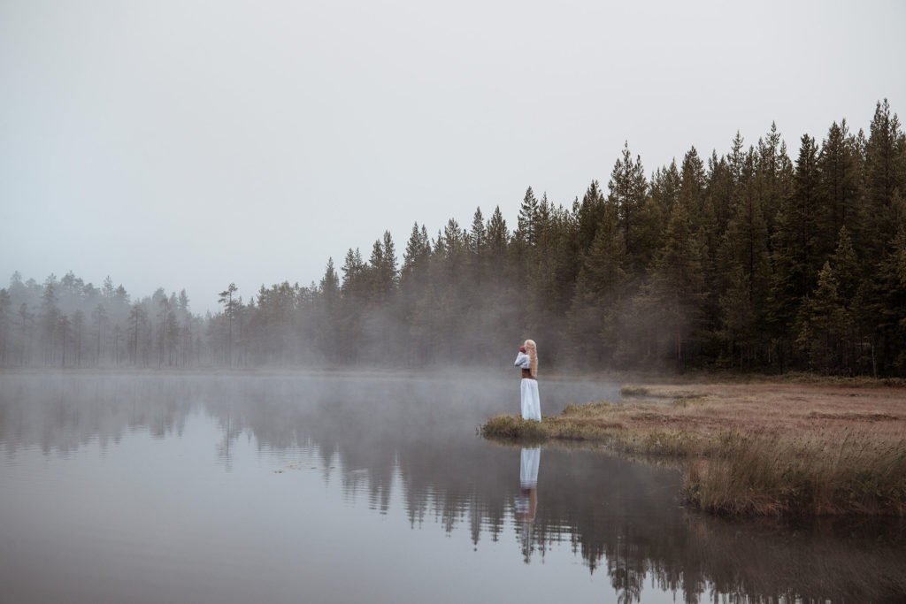 Jonna Jinton by a lake near her home in Grundtjärn, Sweden. JONNA JINTON