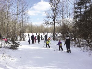 The KidSKi program at Snowflake, which began under George Hovland’s direction, continues to teach skills to children from a young age up through high school. | SUBMITTED
