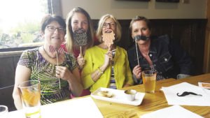 Casey and co-workers from Cook County enjoy a costumed happy hour at Voyageur Brewing.