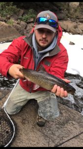 Anglers like Trevor Rod have been catching coasters in North Shore streams.