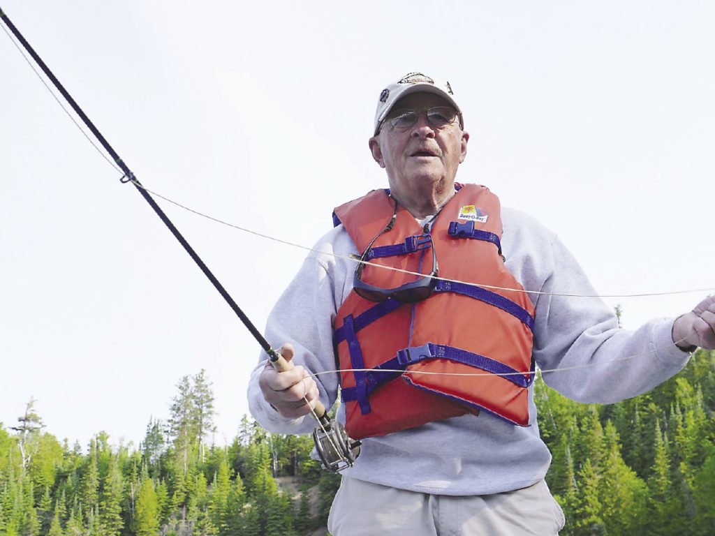 Ray Dupuis Sr. fly fishing on the Nipigon River.