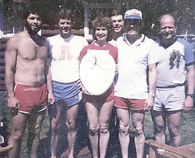 This photo, taken from one of the first races, shows founder Jan Horak [on the left] as well as the Traveling Toilet Seat Trophy. | TOFTE TREK