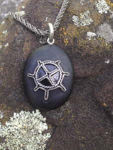 Basalt pendant with sun design in the Tinn Trad tradition, by Brad Nelson.