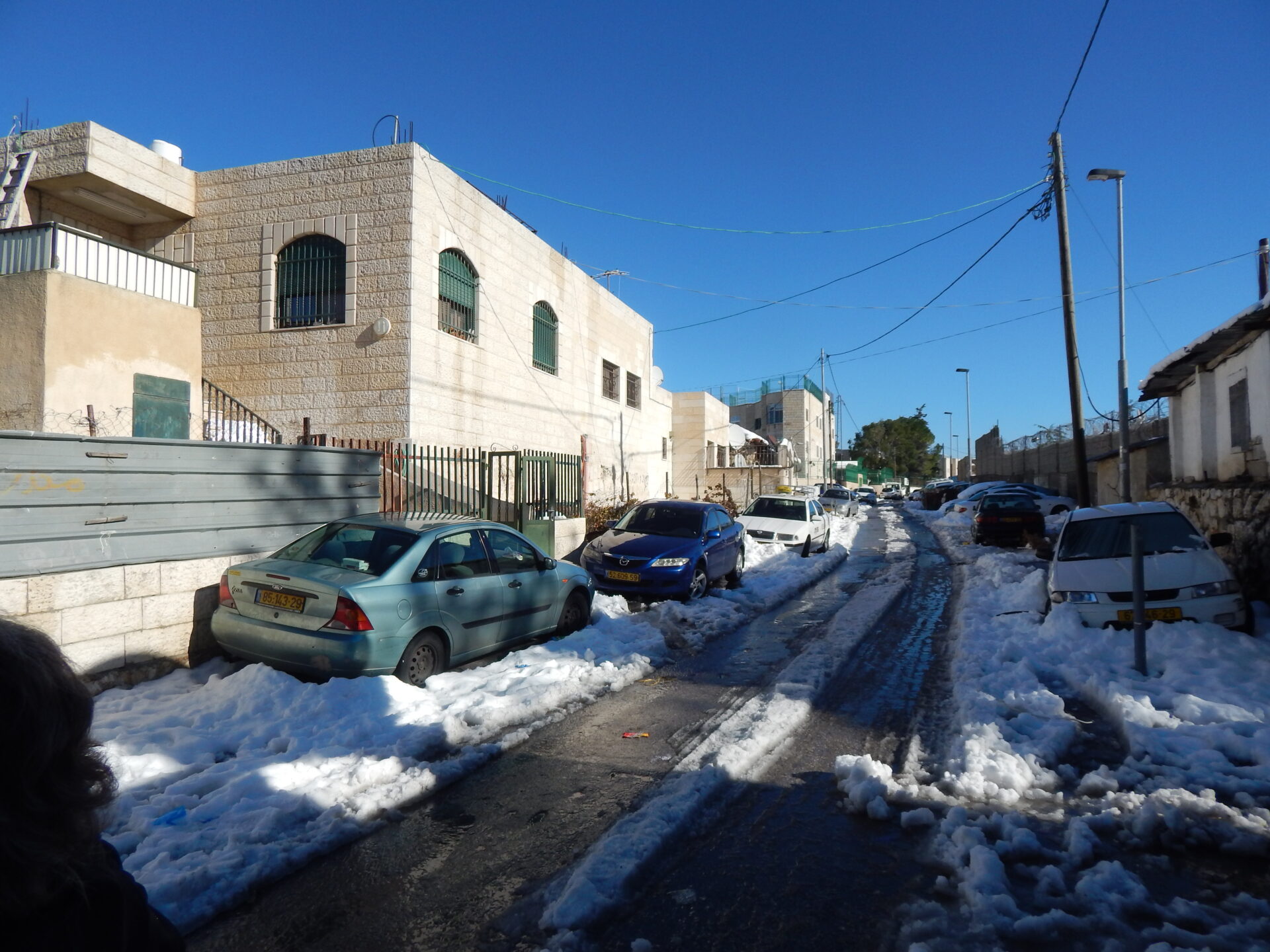 Walking in Jerusalem was difficult with the snow-choked sidewalks ...